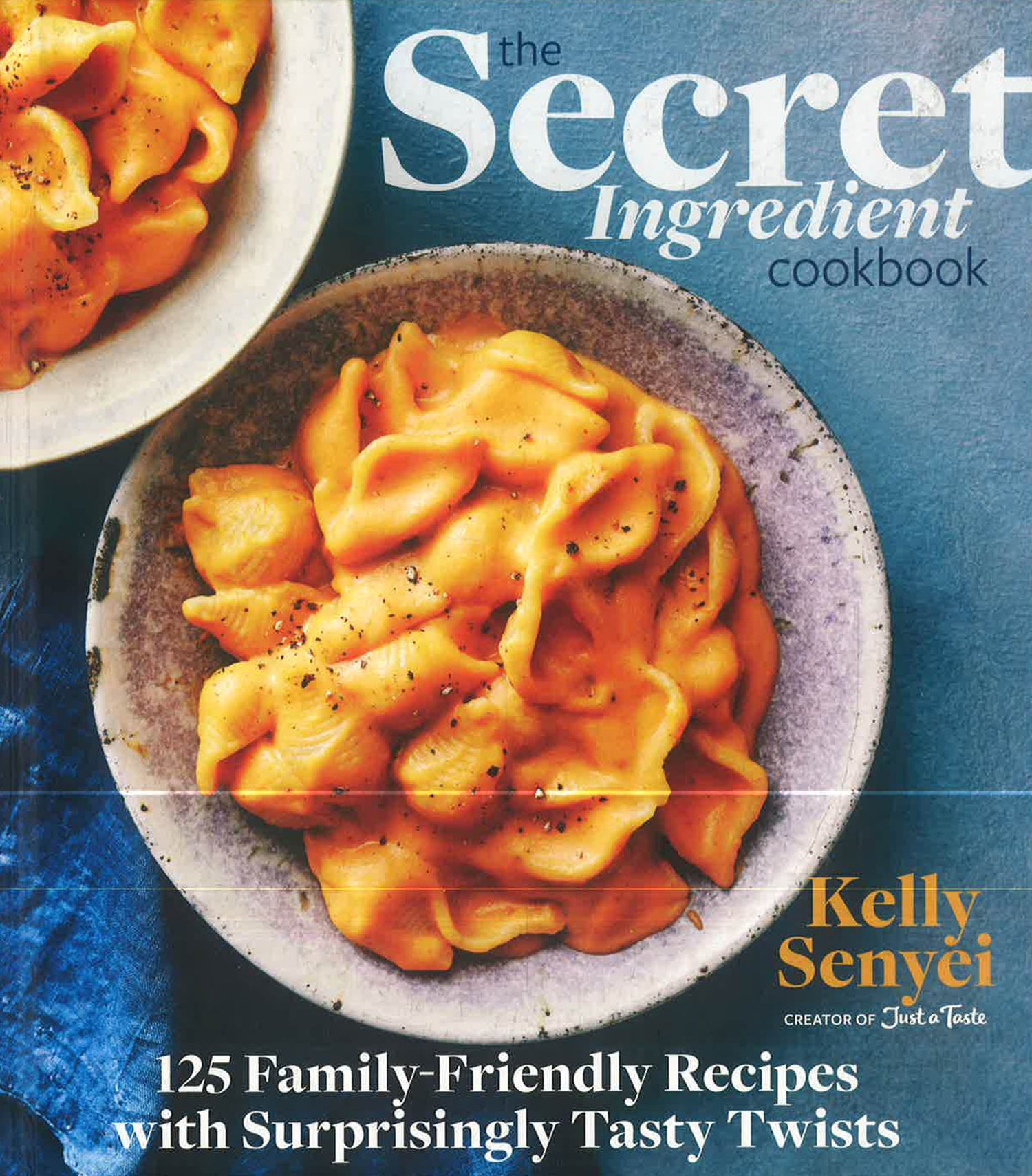 The Secret Ingredient Cookbook: 125 Family-Friendly Recipes With Surprisingly Tasty Twists by Kelly Senyei – book cover