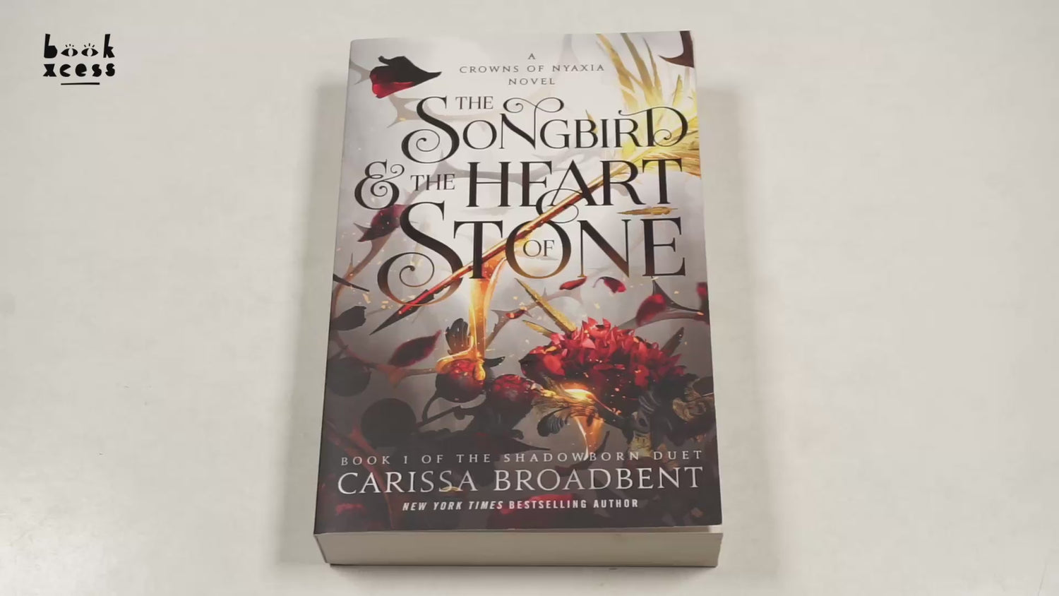 The Shadowborn Duet #1: The Songbird & The Heart Of Stone by Carissa Broadbent – book cover