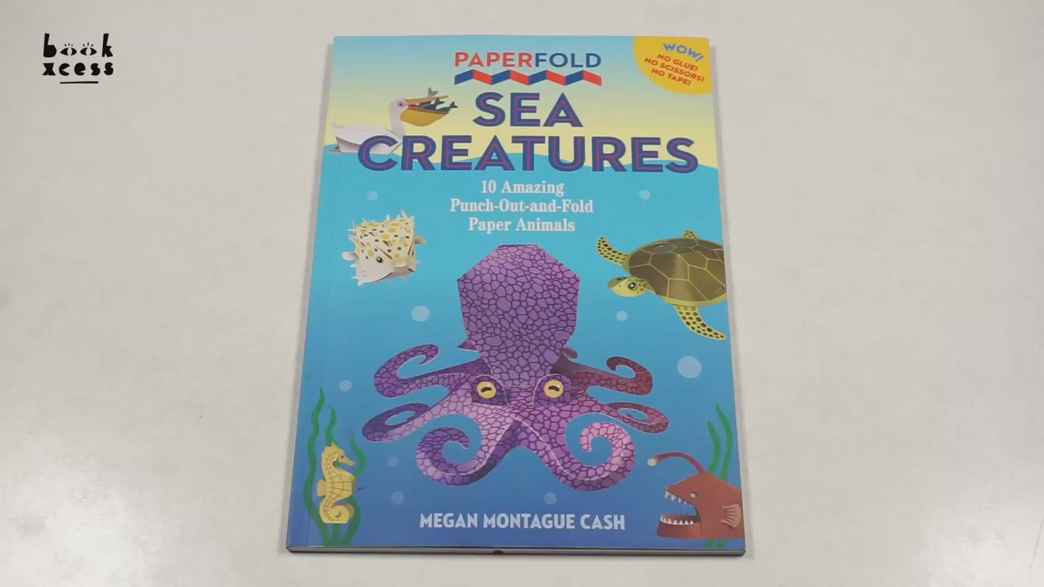 Paperfold Sea Creatures: 10 Amazing Punch-Out-And-Fold Paper Animals by Megan Montague Cash – book cover
