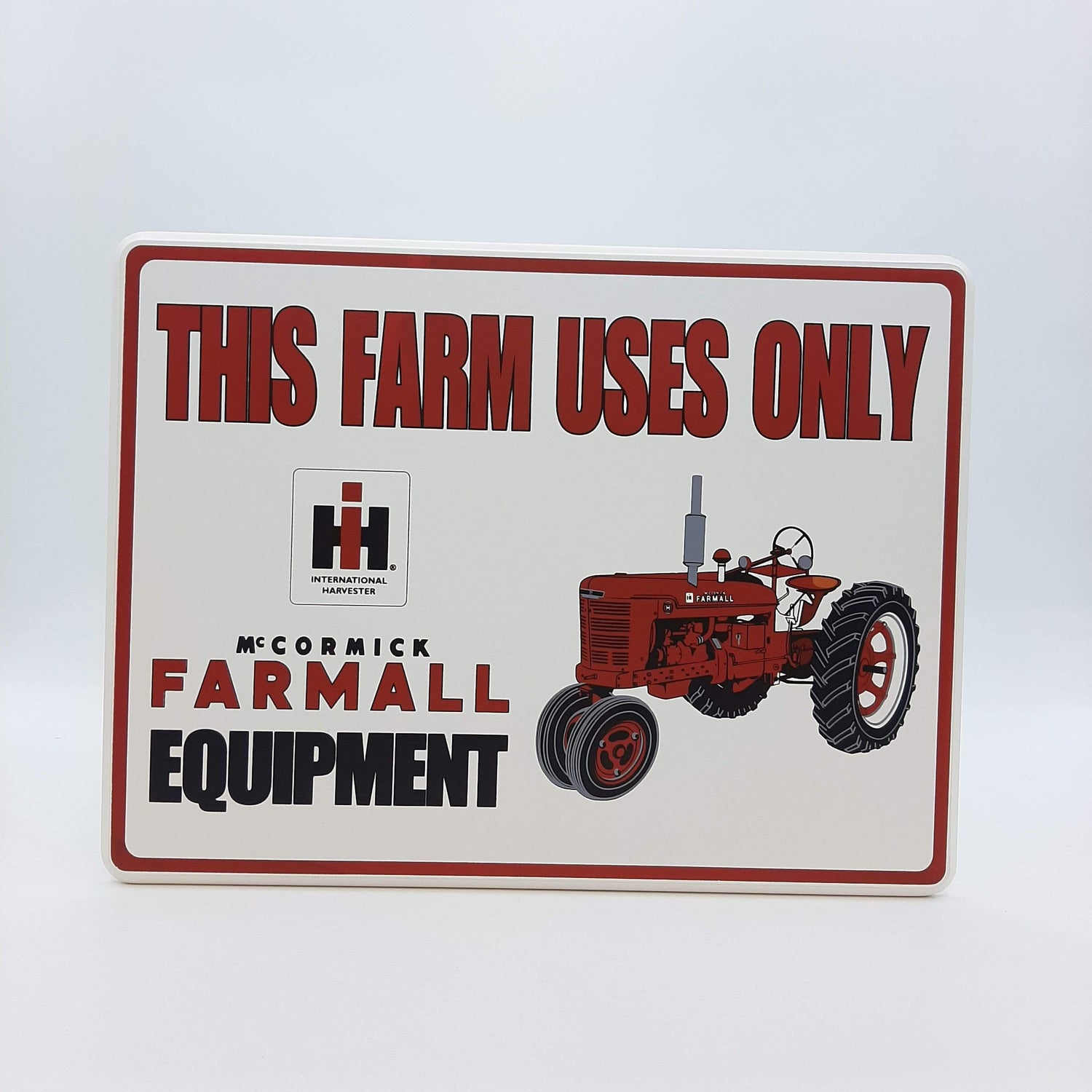 FARMALL: THIS FARM USES ONLY" SIGN